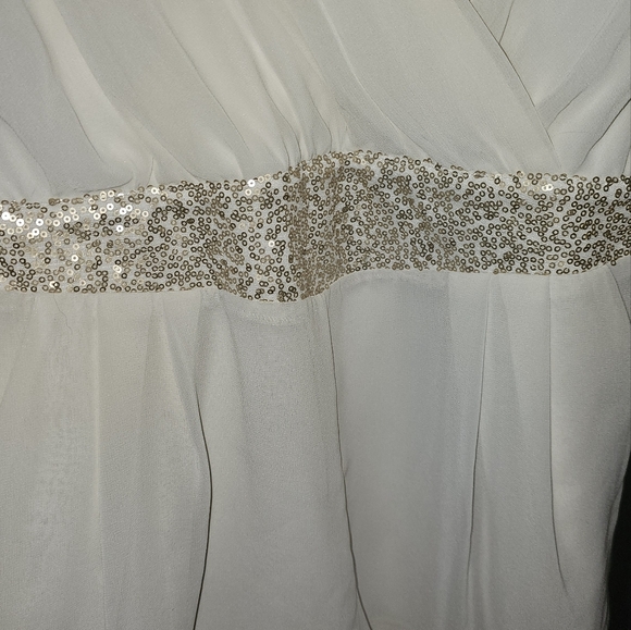 3/20.00. Classy white romper with sequins. - Picture 4 of 10